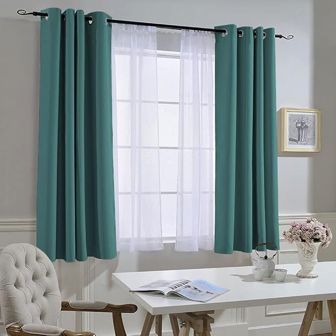 NICETOWN Insulated Curtains Blackout Draperies - Triple Weave Thermal Insulated Solid Ring Top Blackout Panels/Drapes for Bedroom(Sea Teal, Set of 2, 52 x 45 Inch)