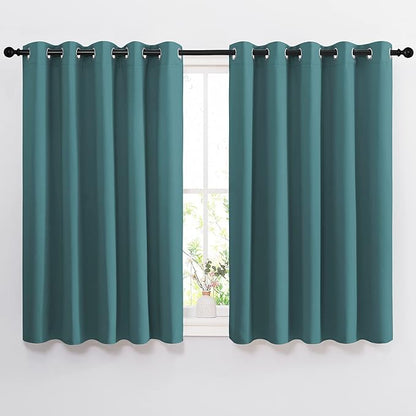 NICETOWN Blackout Curtains for Kids Room - Triple Weave Microfiber Home Thermal Insulated Solid Ring Top Blackout Panels/Drapes for Bedroom(Sea Teal, Set of 2, 66 x 54 Inch)